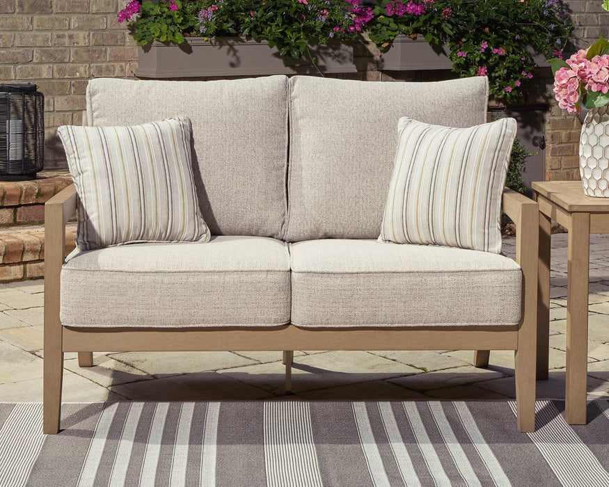 Hallow Creek Outdoor Loveseat with Cushion - Tony’s Furniture Store & Linen (GA) - Multi Location
