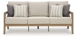 Hallow Creek Outdoor Sofa with Cushion - Tony’s Furniture Store & Linen (GA) - Multi Location