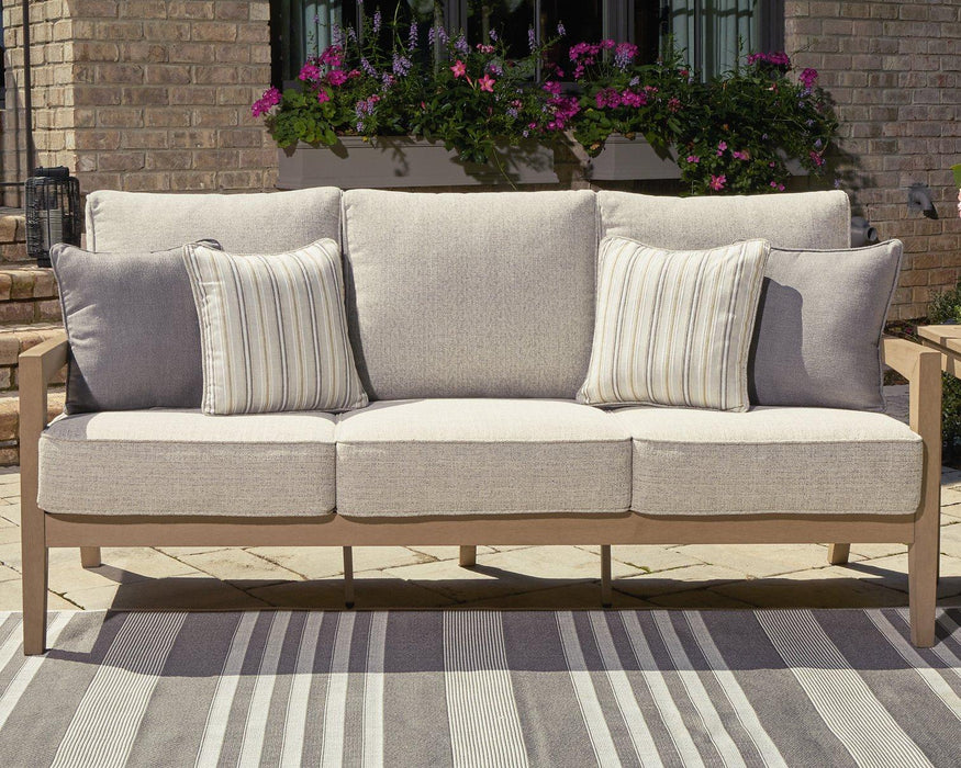 Hallow Creek Outdoor Sofa with Cushion - Tony’s Furniture Store & Linen (GA) - Multi Location