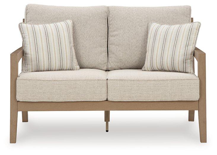 Hallow Creek Outdoor Loveseat with Cushion - Tony’s Furniture Store & Linen (GA) - Multi Location