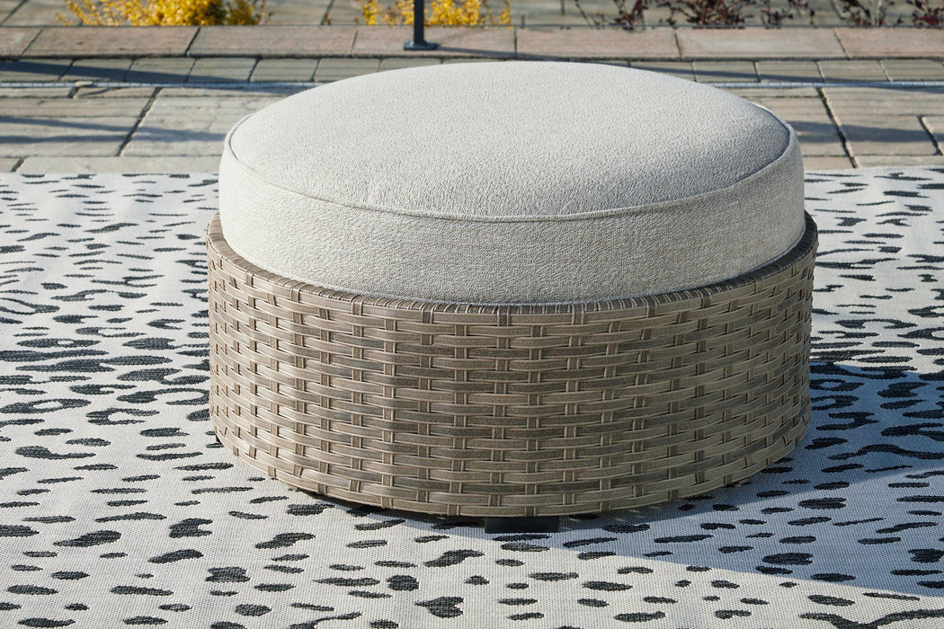 Calworth Outdoor Ottoman with Cushion - Tony’s Furniture Store & Linen (GA) - Multi Location