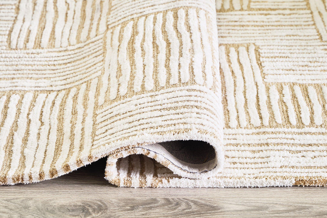 Adanmund 5' x 7' Rug - Tony’s Furniture Store & Linen (GA) - Multi Location