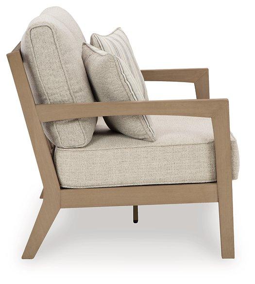 Hallow Creek Outdoor Loveseat with Cushion - Tony’s Furniture Store & Linen (GA) - Multi Location