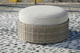 Calworth Outdoor Ottoman with Cushion - Tony’s Furniture Store & Linen (GA) - Multi Location