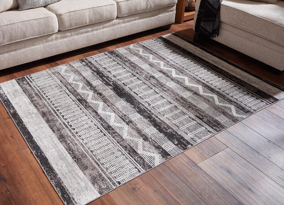 Henchester 5' x 7' Rug - Tony’s Furniture Store & Linen (GA) - Multi Location