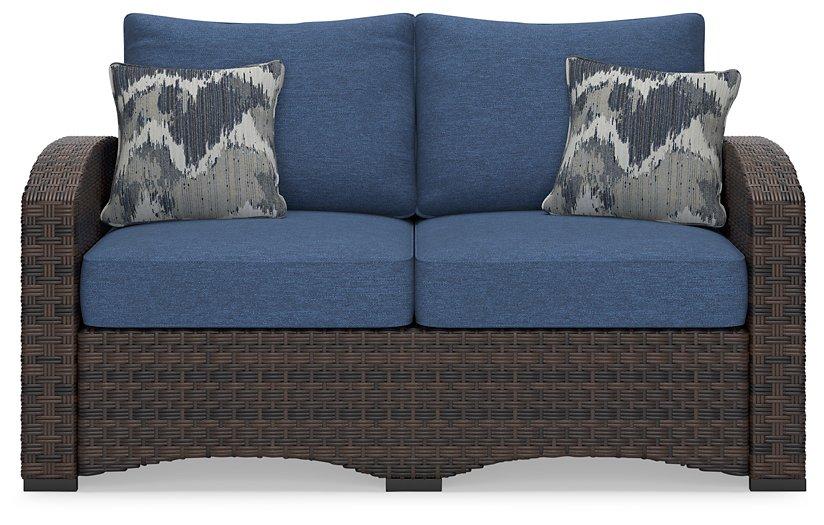 Windglow Outdoor Loveseat with Cushion - Tony’s Furniture Store & Linen (GA) - Multi Location