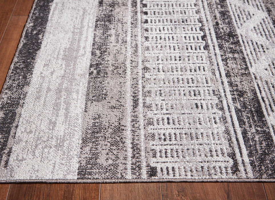 Henchester 5' x 7' Rug - Tony’s Furniture Store & Linen (GA) - Multi Location