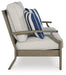 Rainier Ranch Outdoor Loveseat with Cushion - Tony’s Furniture Store & Linen (GA) - Multi Location